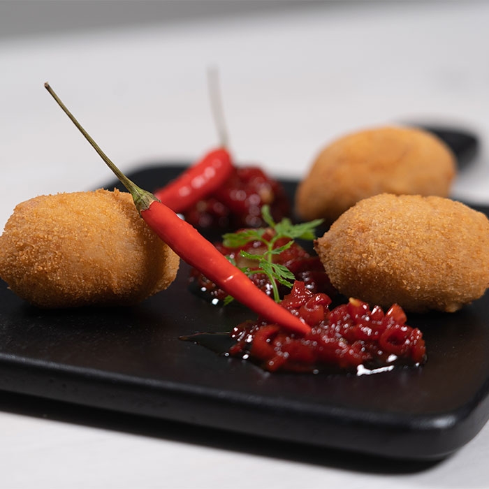 Tuna and piquillo pepper croquettes with piquillo pepper compote